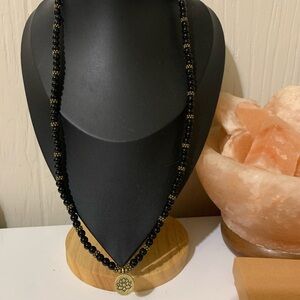 Elegant Black Beaded Necklace with lotus Pendant